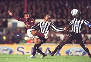 Thierry Henry (Arsenal) Jonathan Zebina and Lilian Thuram (Juventus)