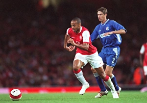 Arsenal v Dinamo Zagreb Collection: Thierry Henry (Arsenal) Marijan Buljat (Dinamo)