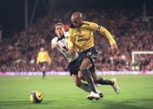 Images Dated 30th November 2006: Thierry Henry (Arsenal) Michael Brown (Fulham)