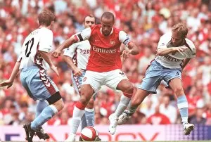 Arsenal v Aston Villa 2006-7 Collection: Thierry Henry (Arsenal) Olof Mellberg (Villa)