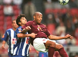 Thierry Henry (Arsenal) and Pedro Emmaunel (Porto). Arsenal 2:1 Porto Thierry Henry (Arsenal) and Pedro Emmaunel (Porto). Arsenal 2:1 Porto