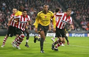 Images Dated 23rd February 2007: Thierry Henry (Arsenal) Phillip Cocu and Carlos Salcidio (PSV)