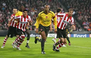 Thierry Henry (Arsenal) Phillip Cocu and Carlos Salcidio (PSV)