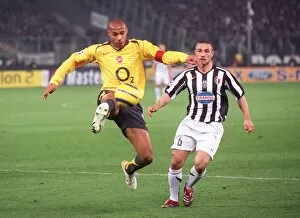 Juventus v Arsenal 2005-6 Collection: Thierry Henry (Arsenal) Robert Kovac (Juve). Juventus 0: 0 Arsenal