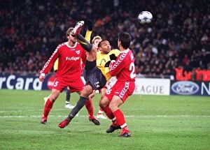 Images Dated 24th November 2005: Thierry Henry (Arsenal) Selver Hodzic (Thun). FC Thun 0: 1 Arsenal