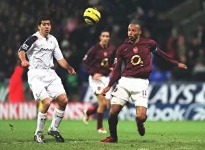 Bolton v Arsenal 2005-6 Collection: Thierry Henry (Arsenal) Tal Ben Haim (Bolton). Bolton Wanderers 2: 0 Arsenal