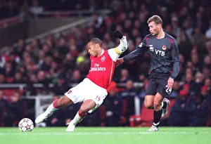 Arsenal v CSKA Moscow 2006-07 Collection: Thierry Henry (Arsenal) Vasili Berezutskiy (CSKA)