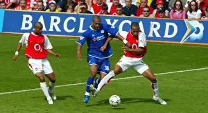 Thierry Henry and Ashley Cole (Arsenal) Marcu Bent (Leicester)