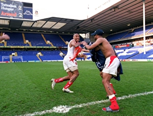 Thierry Henry and Ashley Cole celebrate at the end of the match Thierry Henry and Ashley Cole celebrate at the end of the match