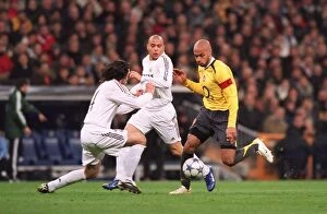 Thierry Henry beats Alvaro Mejia (Real) on his way to scoring Arsenals goal