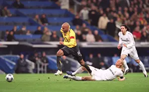 Thierry Henry beats Guti (Real) on his way to scoring Arsenals goal