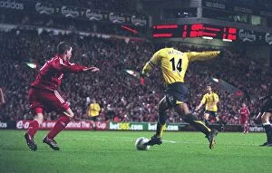 Liverpool v Arsenal FA Cup 2006-7 Collection: Thierry Henry breaks past Liverpool defender Daniel Agger to score the 3rd Arsenal goal