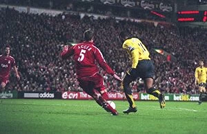 Liverpool v Arsenal FA Cup 2006-7 Collection: Thierry Henry breaks past Liverpool defender Daniel Agger to score the 3rd Arsenal goal