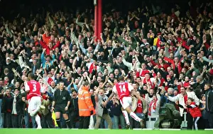Thierry Henry breaks through the Tottenham defence on his way to scoring the 1st Arsenal goal