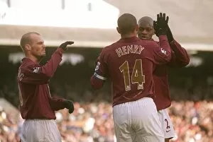 Images Dated 4th March 2006: Thierry Henry celebrates scoring Arsenals 1st goal with Abou Diaby