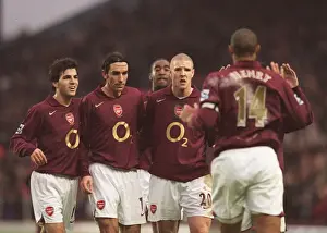 Thierry Henry celebrates scoring Arsenals 3rd goal his 2nd with Cesc Fabregas