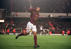 Thierry Henry celebrates scoring Arsenals 4th goal from the penalty spot