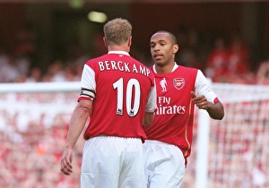Trending: Thierry Henry celebrates scoring with Dennis Bergkamp
