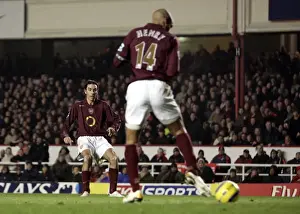 Thierry Henry delfects a shot by Robert Pires into the goal for Arsenals 1st goal
