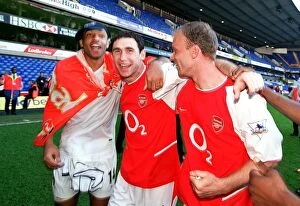 Images Dated 7th April 2005: Thierry Henry, Martin Keown and Dennis Bergkamp (Arsenal) celebrate winning the league