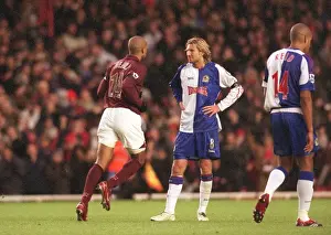 Thierry Henry runs past Robbie Savage (Blackburn) after scoring Arsenals 2nd goal