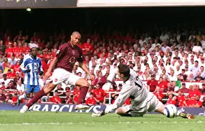 Thierry Henry scores his 1st Arsenals 2nd goal past Mike Pollitt (Wigan)
