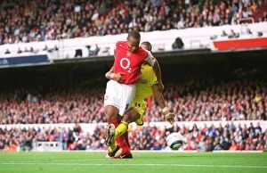 Henry Thierry Collection: Thierry Henry scores his 1st goal (Arsenals 2nd) under pressure from Jonathan Fortune