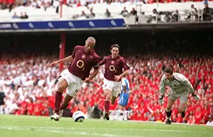 Thierry Henry scores Arsenals 3rd goal his 2nd past Mike Pollitt (Wigan)