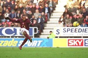 Images Dated 21st November 2005: Thierry Henry scores Arsenals 3rd goal (his 2nd) from a free kick