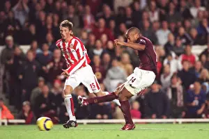 Thierry Henry scores Arsenals 3rd goal watched by Danny Collins (Sunderland)