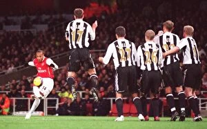 Henry Thierry Collection: Thierry Henry scores Arsenals goal from a free kick