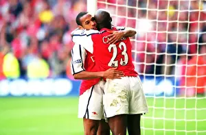 Thierry Henry and Sol Campbell celebrate the Arsenla victory
