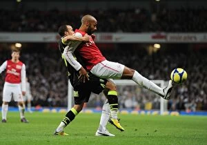 Arsenal v Leeds United FA Cup 2011-12 Collection: Thierry Henry vs Andros Townsend: A FA Cup Showdown at the Emirates (2011-12)