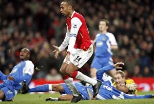 Images Dated 11th February 2007: Thierry Henry watches the ball go into the net for Arsenals 1st goal
