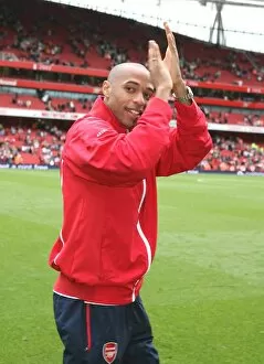 Thierry Henry waves to the Arsenal fans before the match