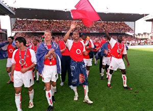 Thierry Henry waves to the fans as the players do a lap of honour Thierry Henry waves to the fans as the players do a lap of honour