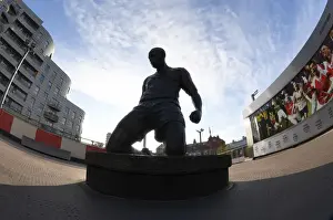 Thierry Henry's Enduring Legacy: A Statue of Greatness at Emirates Stadium during Europa League Play