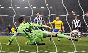 West Bromwich Albion V Arsenal 2013-14 - Capital Cup Prints: Thomas Eisfeld Scores the Winner: Arsenal Triumphs over West Bromwich Albion in Capital One Cup