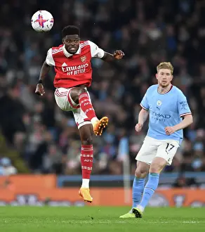 Thomas Partey in Action: A Battle at Etihad Stadium - Manchester City vs. Arsenal, Premier League 2022-23