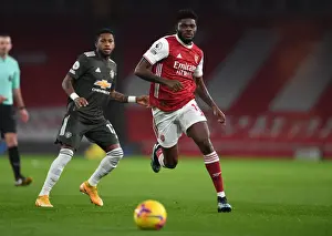Arsenal V Manchester United 2020-21 Prints: Thomas Partey in Action: Empty Emirates Stadium - Arsenal vs Manchester United (2020-21 Premier League)