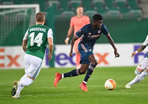 Rapid Vienna V Arsenal 2020-21 Prints: Thomas Partey Breaks Past Rapid Wien's Defense in Arsenal's Europa League Clash