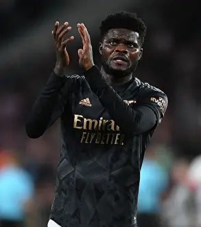 PSV Eindhoven V Arsenal 2022-23 Prints: Thomas Partey Celebrates with Arsenal Fans after Europa League Victory over PSV Eindhoven