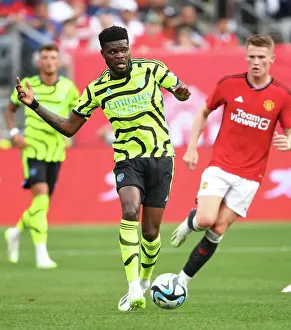 Arsenal V Manchester United - Pre Season 2023-24 Prints: Thomas Partey Faces Off Against Manchester United in 2023-24 Arsenal Pre-Season Clash