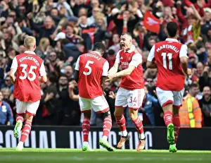 Thomas Partey and Granit Xhaka Celebrate Arsenal's First Goal Against Tottenham Hotspur (2022-23)