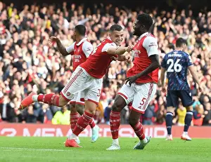 Thomas Partey and Granit Xhaka Celebrate Arsenal's Fourth Goal vs. Nottingham Forest (2022-23)