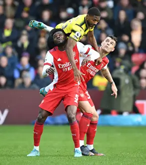 Thomas Partey and Granit Xhaka Clash with Emmanuel Dennis in Intense Watford vs. Arsenal Premier League Encounter