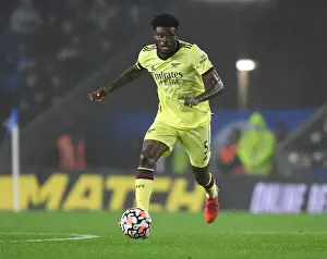 Brighton And Hove Albion V Arsenal 2021-22 Prints: Thomas Partey: Midfield Masterclass - Arsenal's Shining Star in Premier League Victory over Brighton & Hove Albion