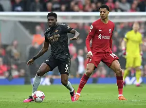 Thomas Partey vs. Cody Gakpo: Intense Battle at Anfield - Liverpool vs. Arsenal, Premier League 2022-23