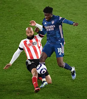 Thomas Partey vs. David McGoldrick: A Battle in the Premier League - Sheffield United vs. Arsenal (April 2021)