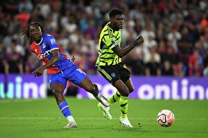 Images Dated 21st August 2023: Thomas Partey vs. Eberechi Eze: A Battle for Possession in the 2023-24 Crystal Palace vs
